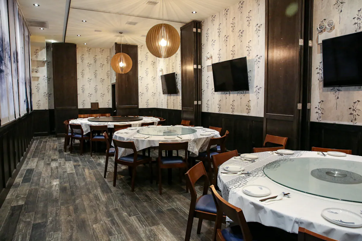 a large room with tables and chairs